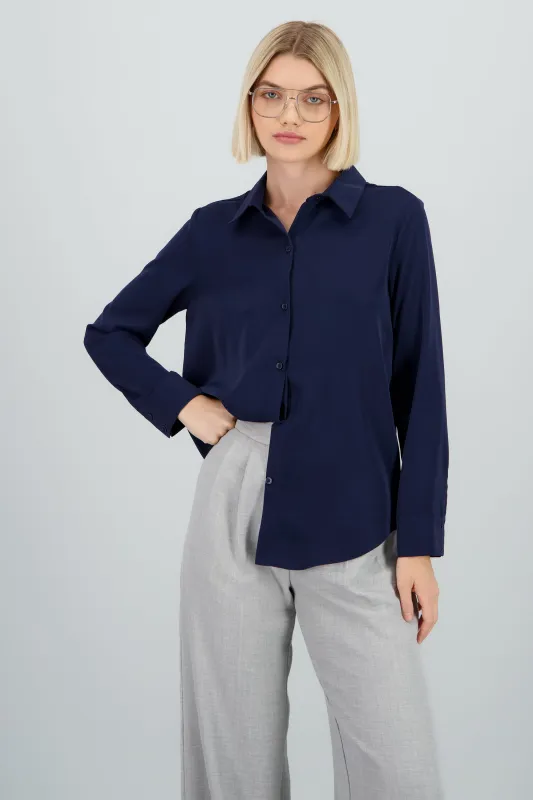 Camisa lisa manga larga botones sold by Shasa