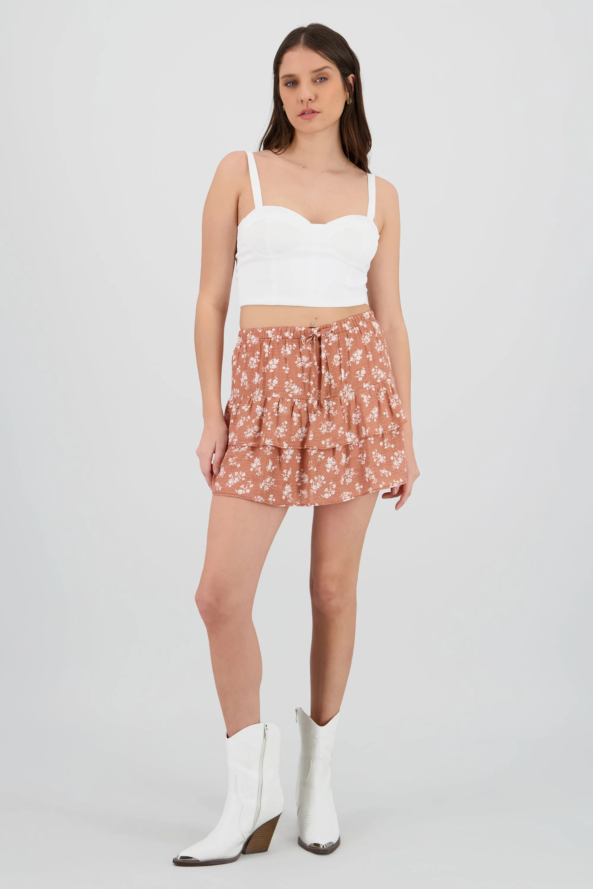 Falda mini flores de olanes sold by Shasa