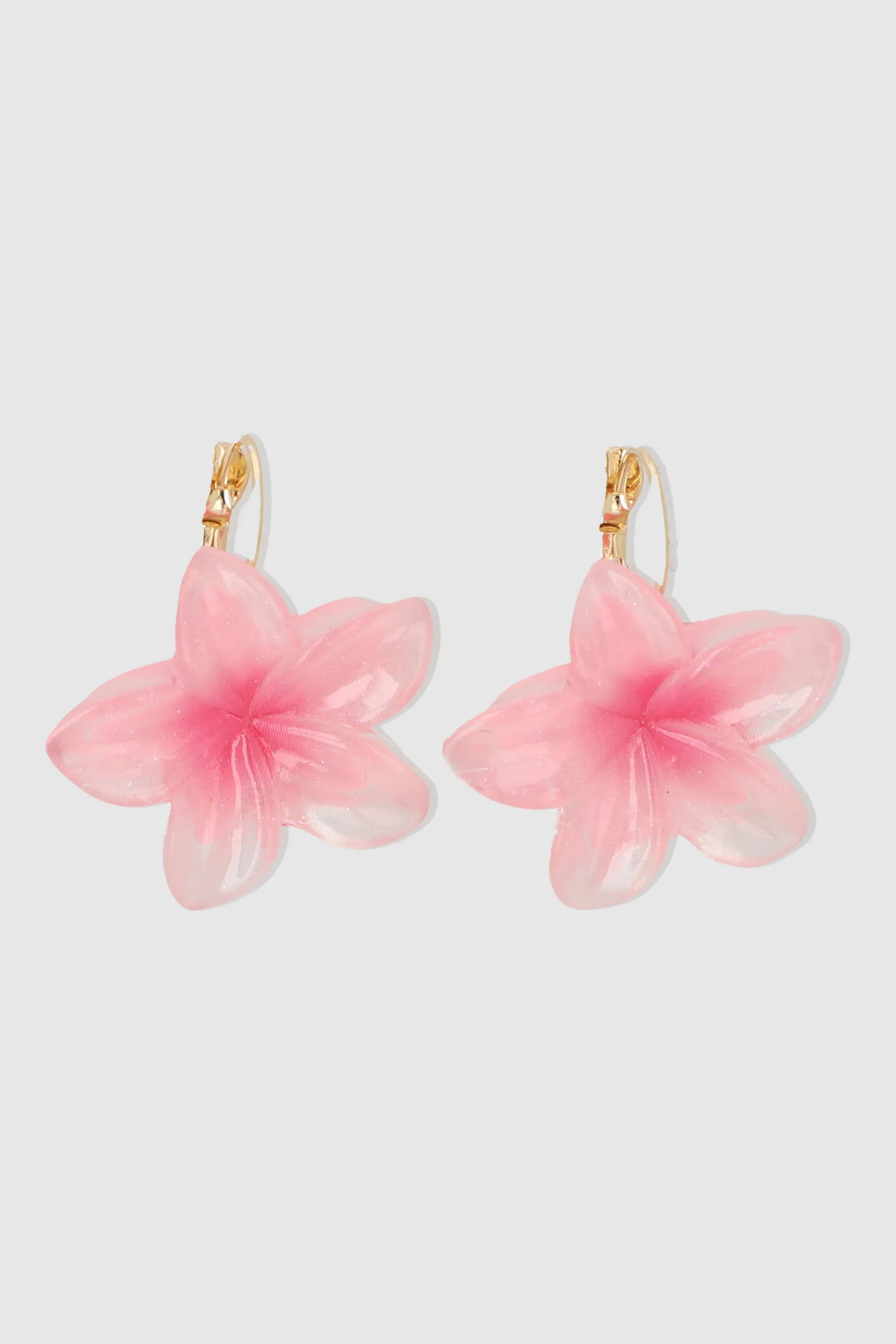 Arracadas flor hawaiana sold by Shasa