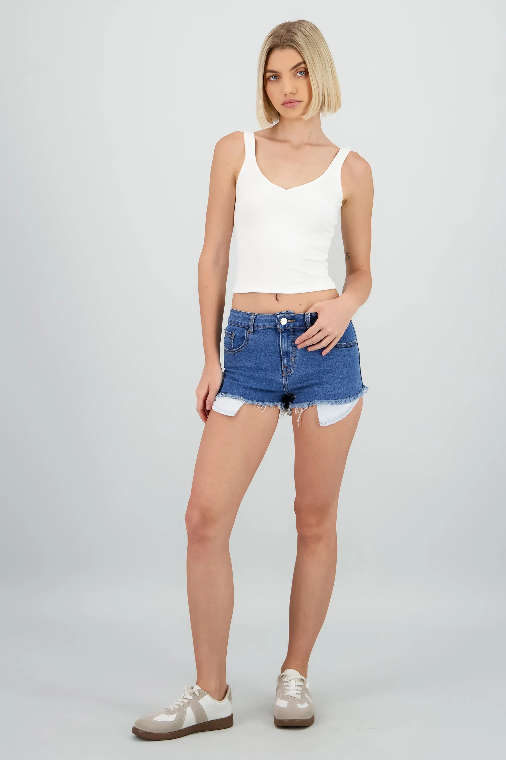 Mini short flecos sold by Shasa