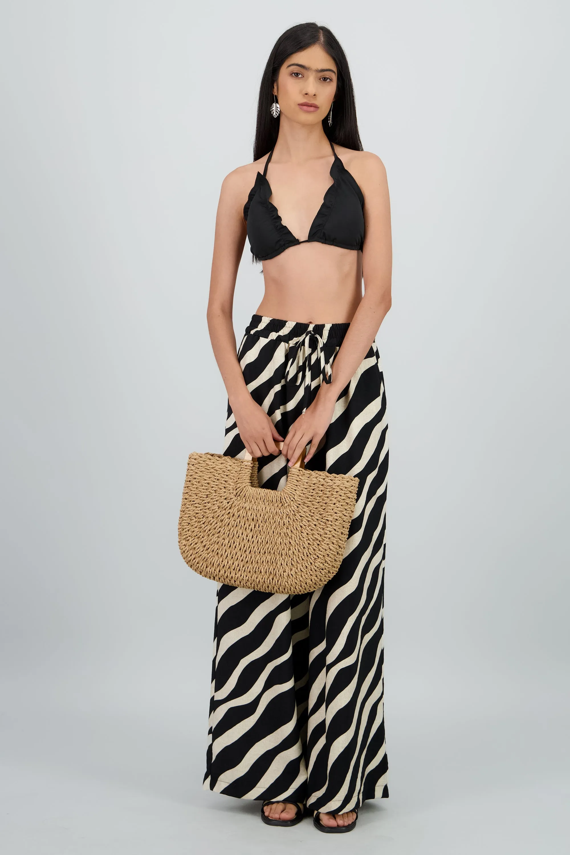 Pantalones estampado tropical jareta sold by Shasa