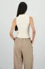 Top tejido cuello polo sin mangas sold by Shasa