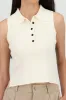 Top tejido cuello polo sin mangas sold by Shasa