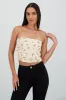 Top tubo drapeado strapless detalle mesh sold by Shasa