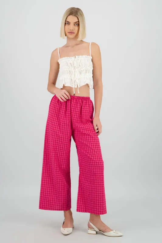 Pantalon cuadros sold by Shasa