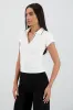Top cuello polo sold by Shasa