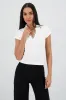 Top cuello polo sold by Shasa