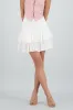 Falda mini doble olan detalle textura sold by Shasa