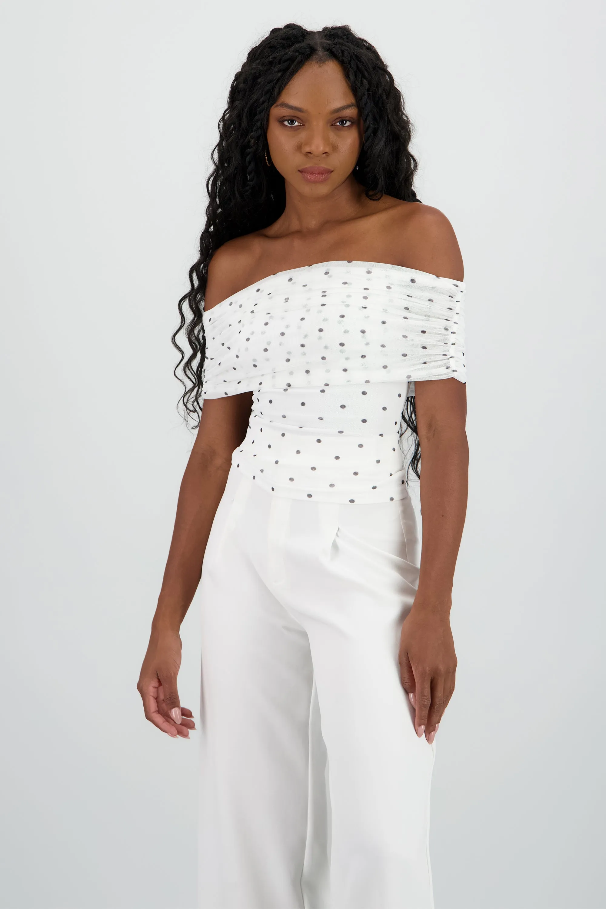 Top off shoulder polka dots sold by Shasa