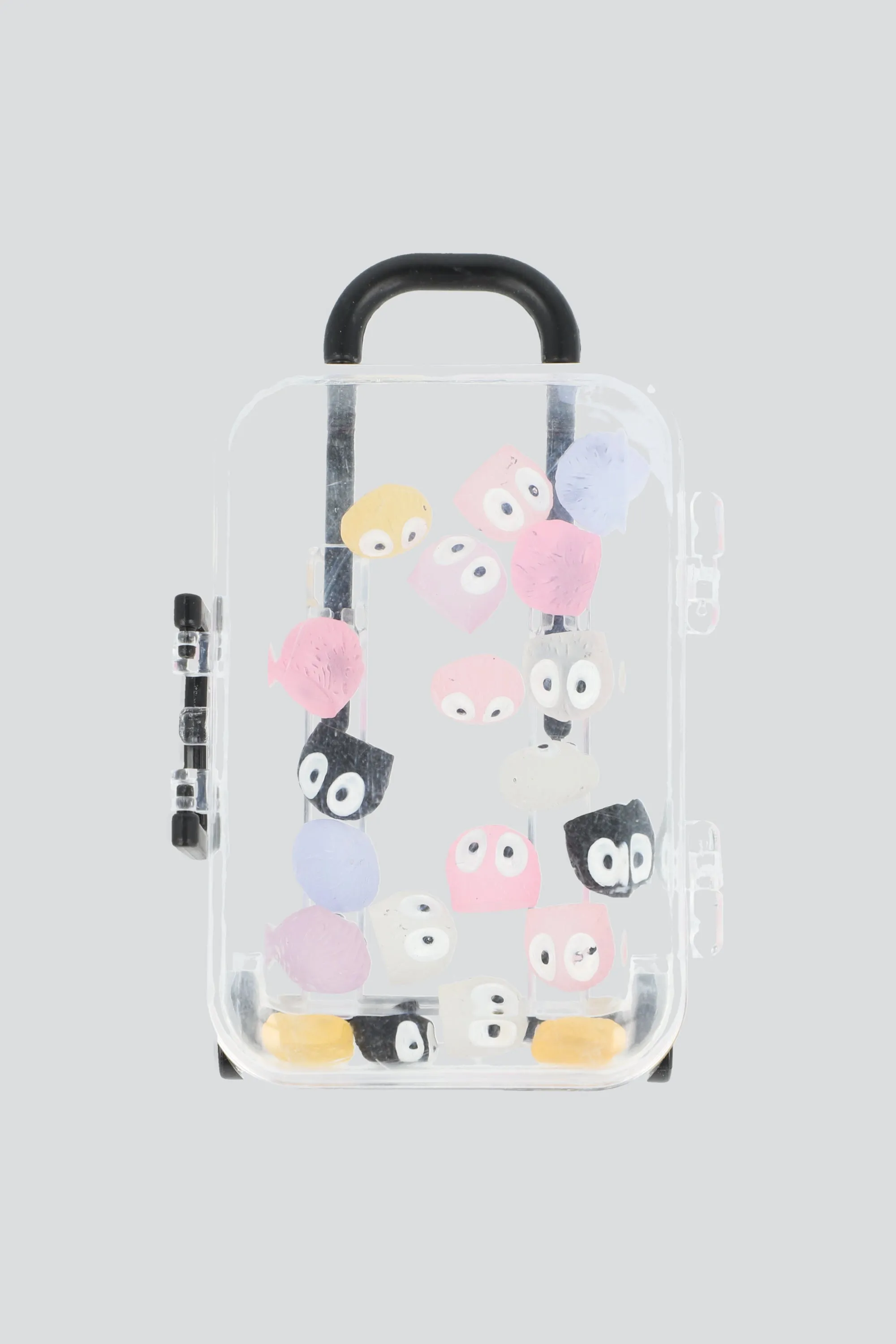 Mini maleta con 20 mini monstruos sold by Shasa