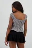 Blusa manga corta cuadros detalle moños sold by Shasa