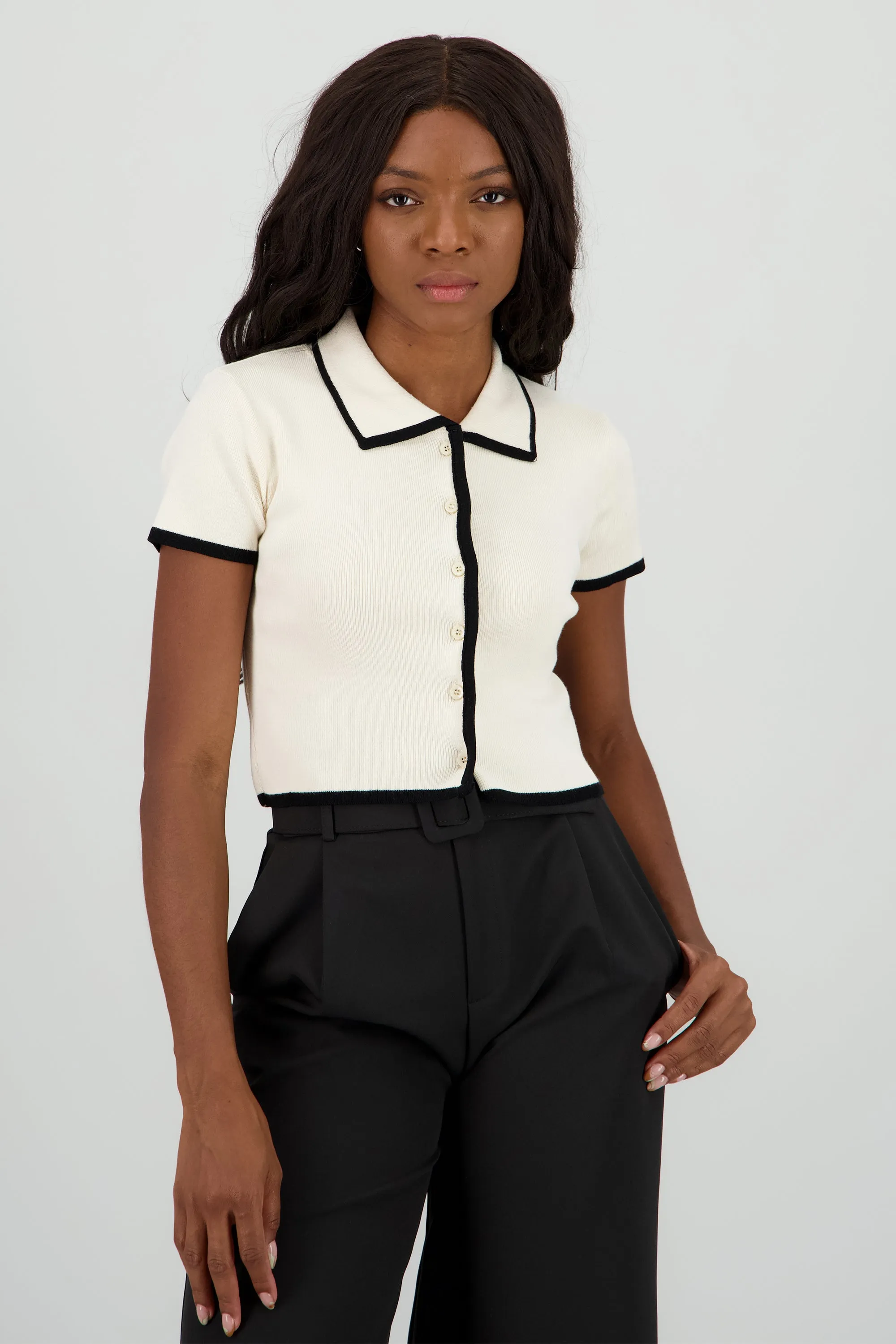 Top tejido contraste polo botones sold by Shasa