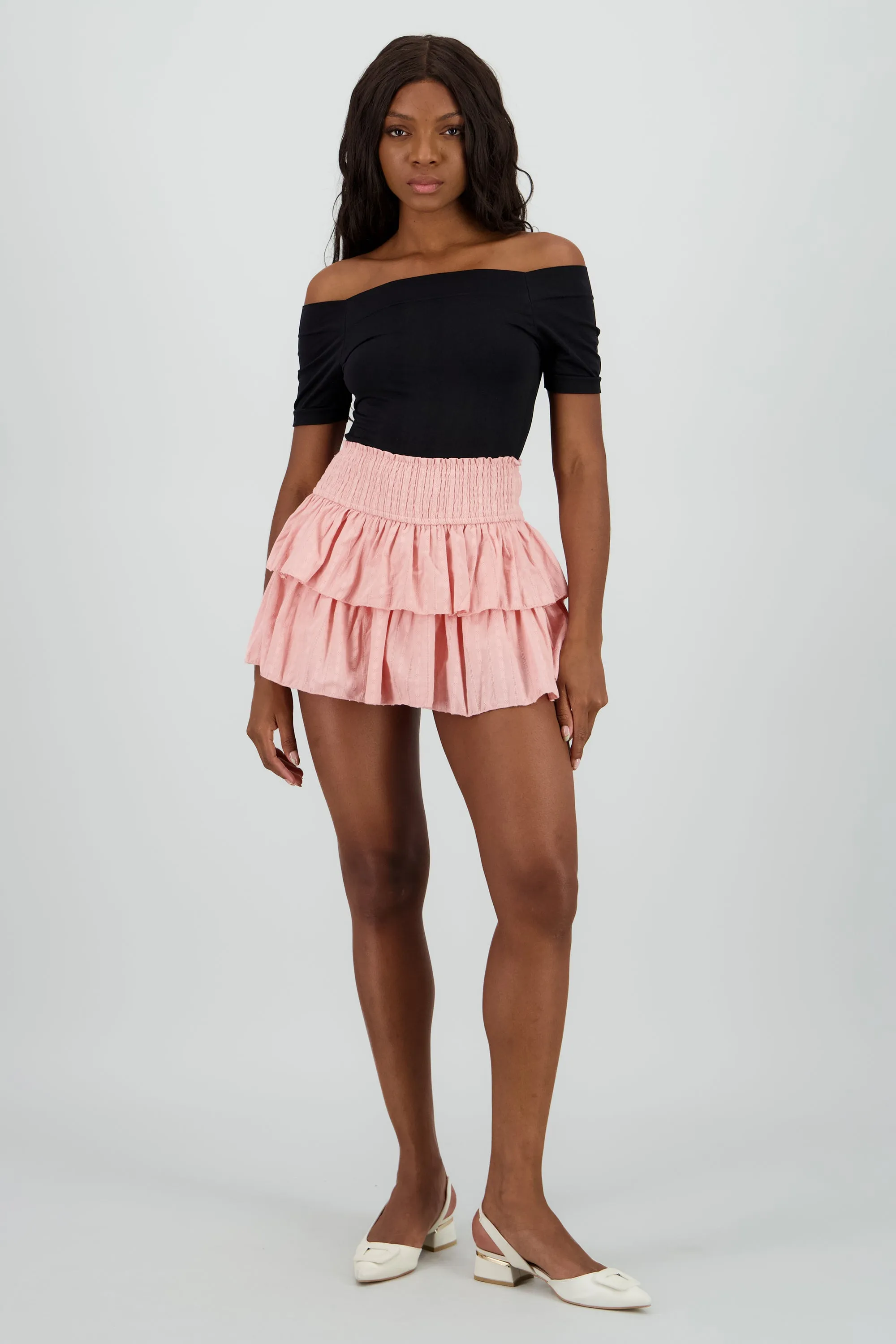 Mini falda olanes color solido sold by Shasa