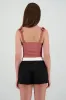 Bodysuit Liso Con Tirante Moños Hypsters sold by Shasa