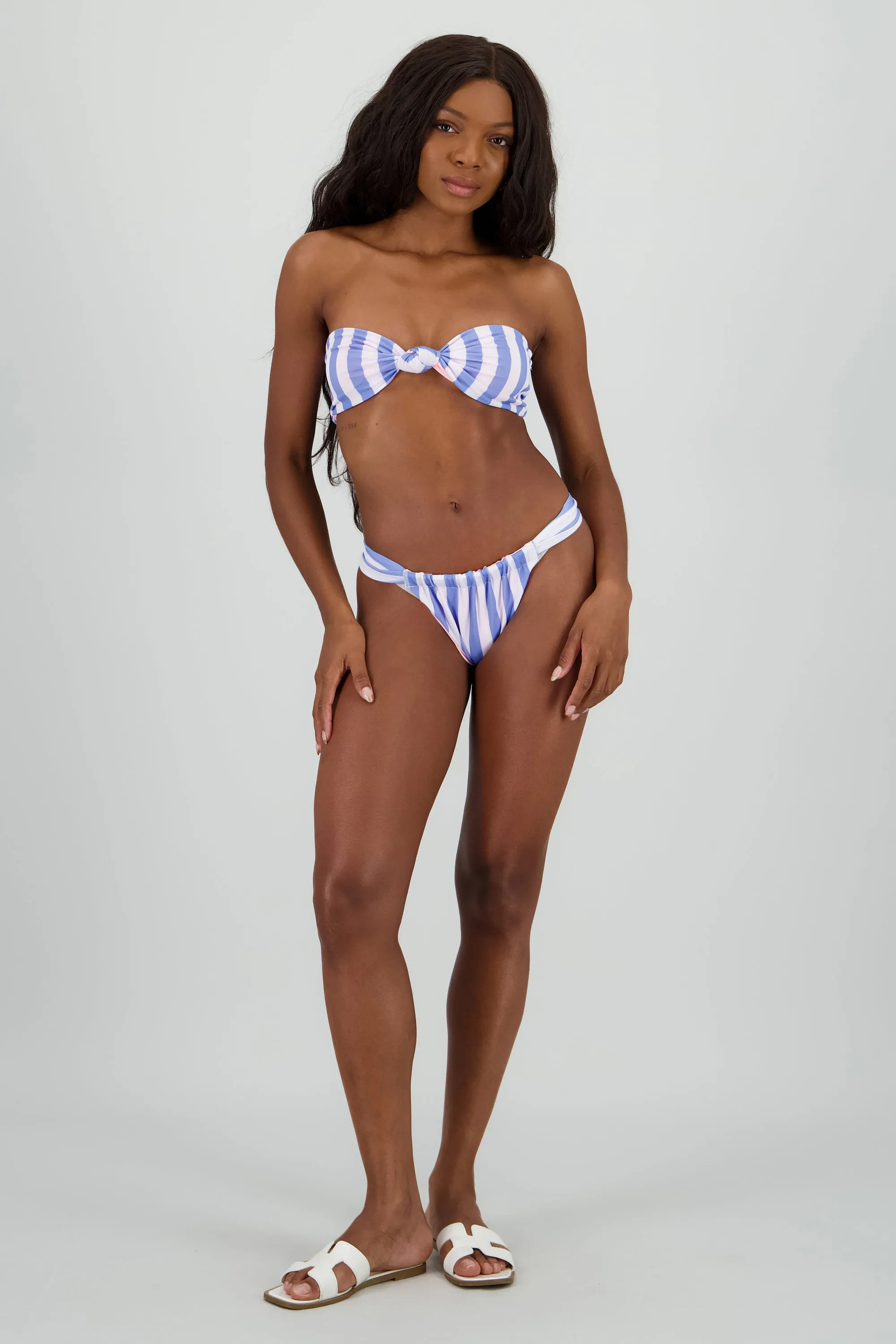 Bikini doble vista liso y rayas sold by Shasa