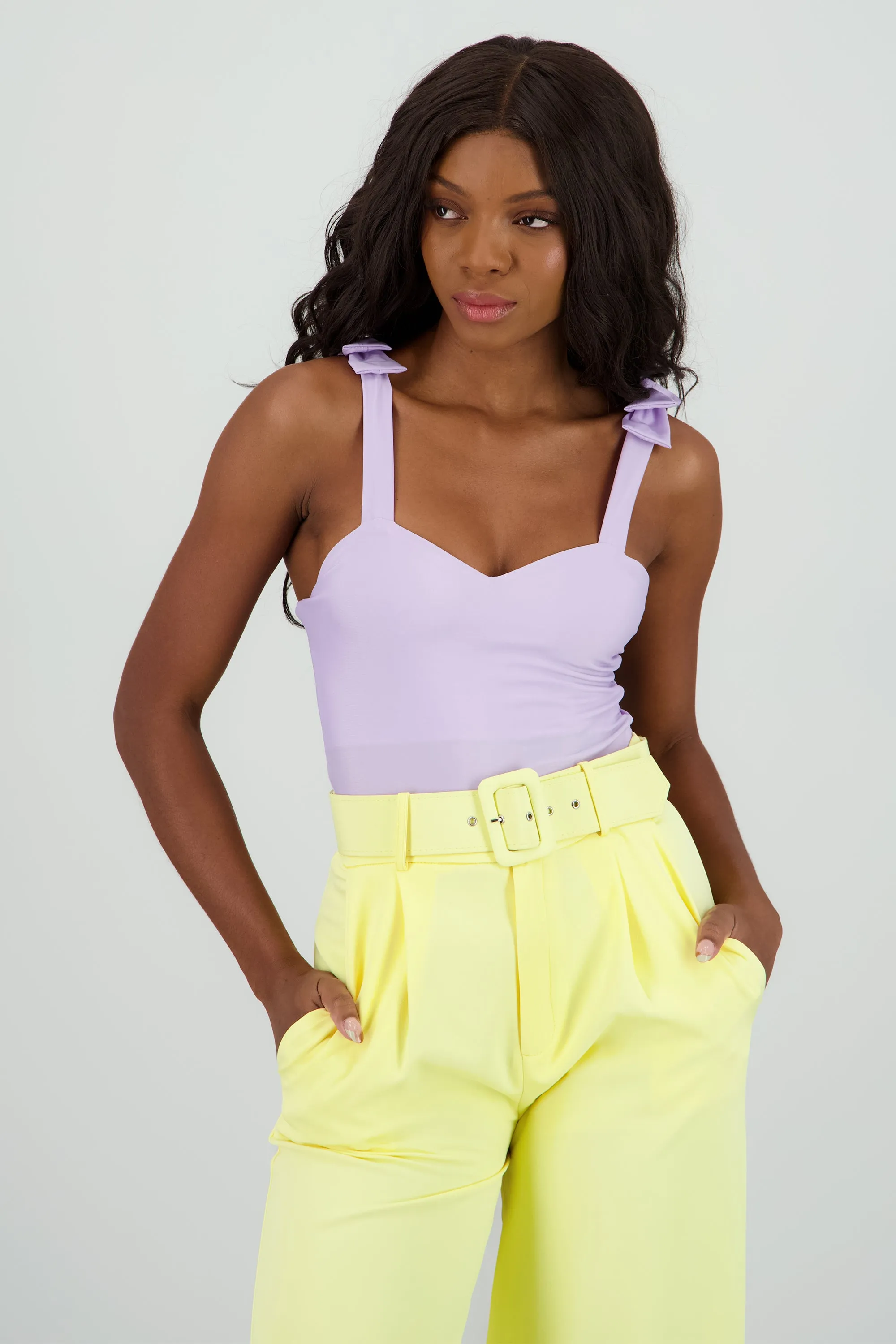 Bodysuit liso con tirante moños sold by Shasa