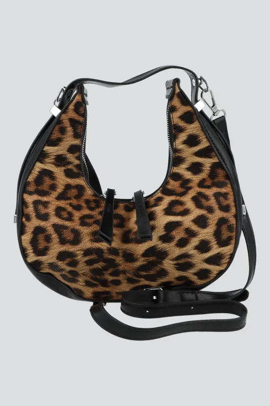 Bolsa media luna animal print sold by Shasa