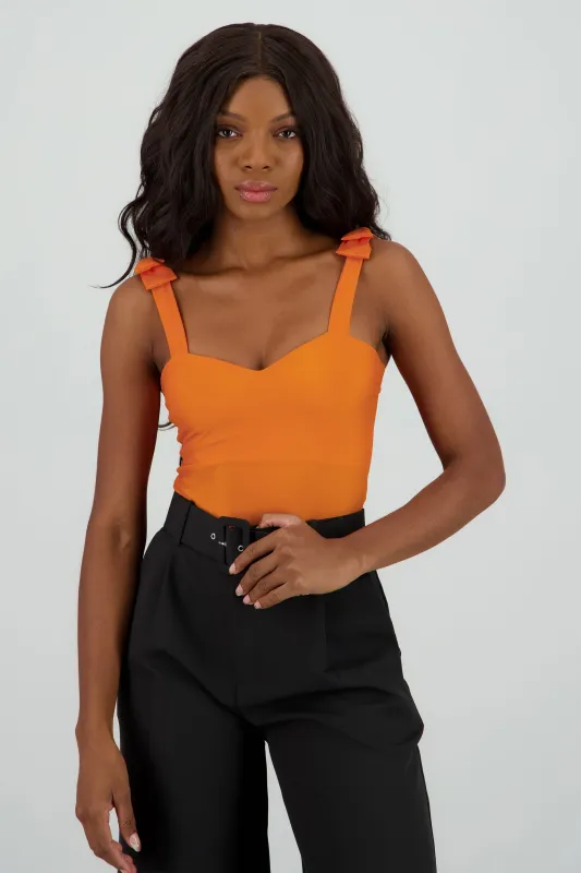 Bodysuit liso con tirante moños sold by Shasa