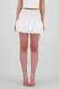 Falda mini globo con detalle de smock en pretina sold by Shasa