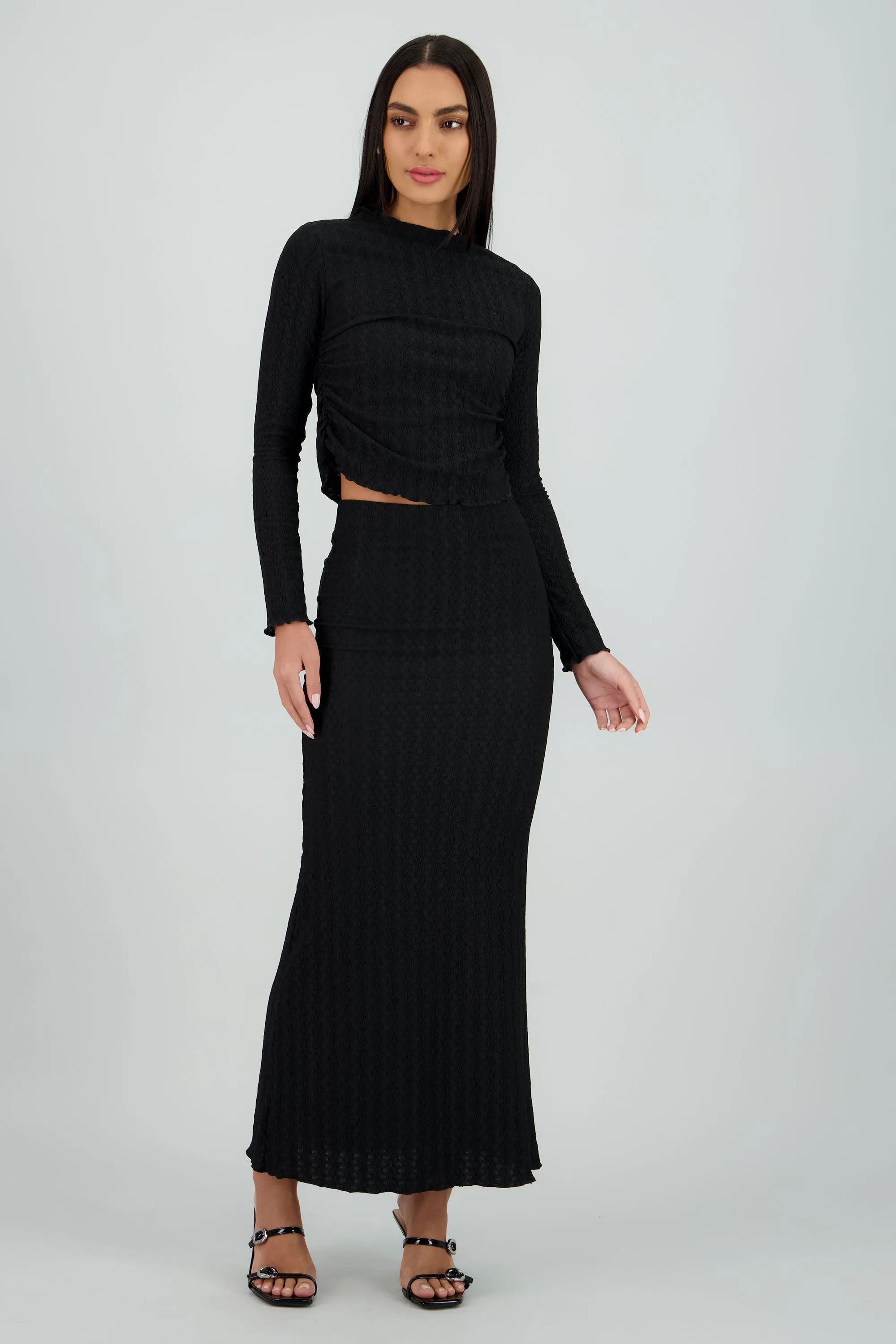 Falda midi con textura sold by Shasa