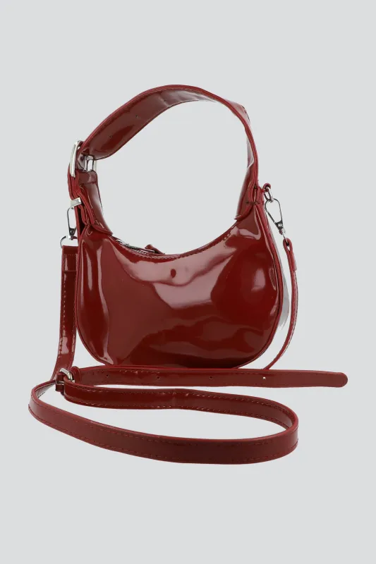 Bolsa mini charol half moon sold by Shasa