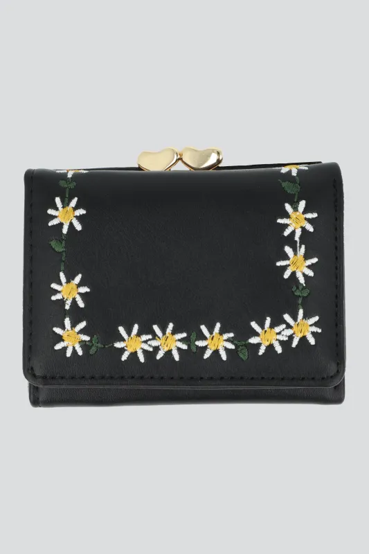 Cartera margaritas bordadas sold by Shasa