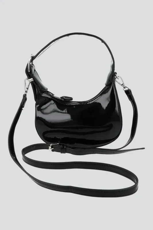 Bolsa mini charol half moon sold by Shasa