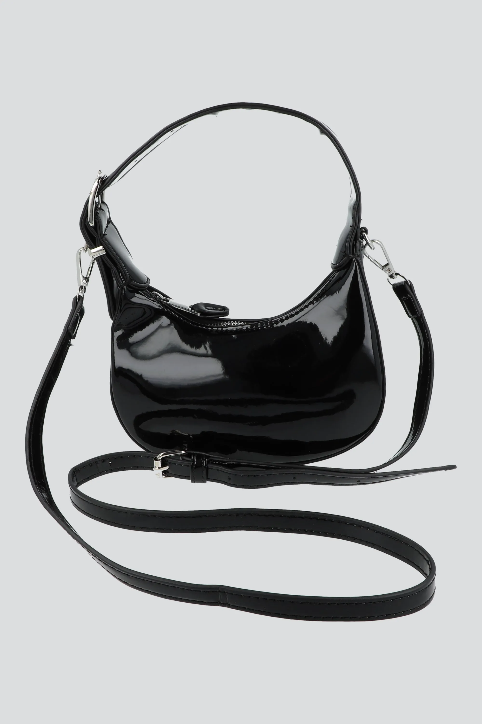 Bolsa mini charol half moon sold by Shasa
