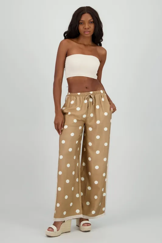 Pantalon fluido resorte detalle costados sold by Shasa