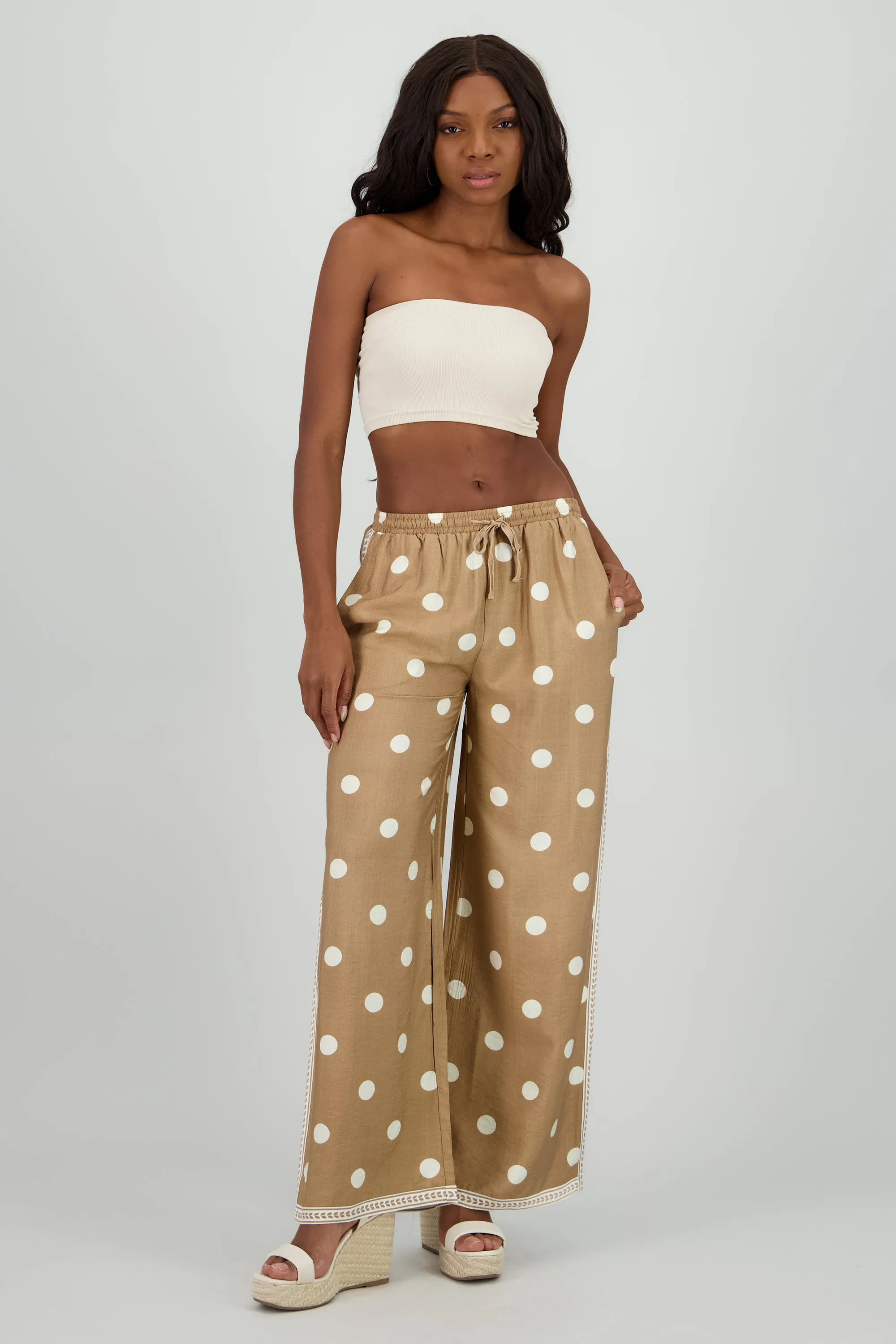 Pantalon fluido resorte detalle costados sold by Shasa