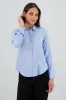 Camisa lisa manga larga detalle botones sold by Shasa