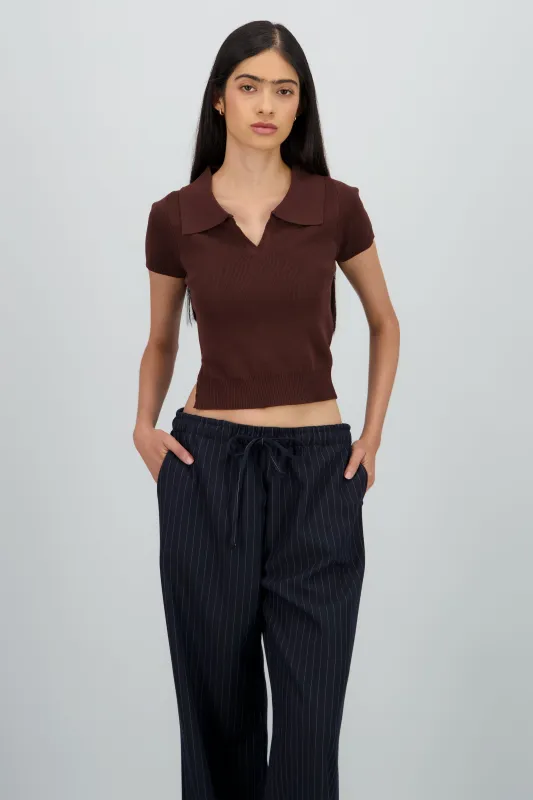 Top polo tejido rayas sold by Shasa