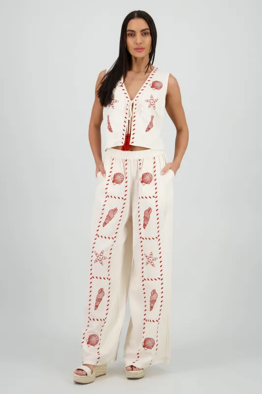 Pantalon amplio bordado conchas sold by Shasa