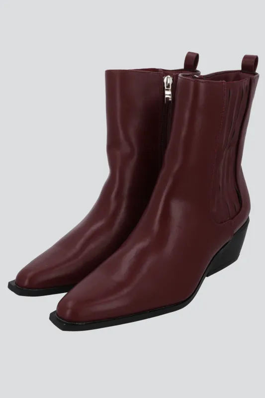 Botin vaquero elasticos sold by Shasa