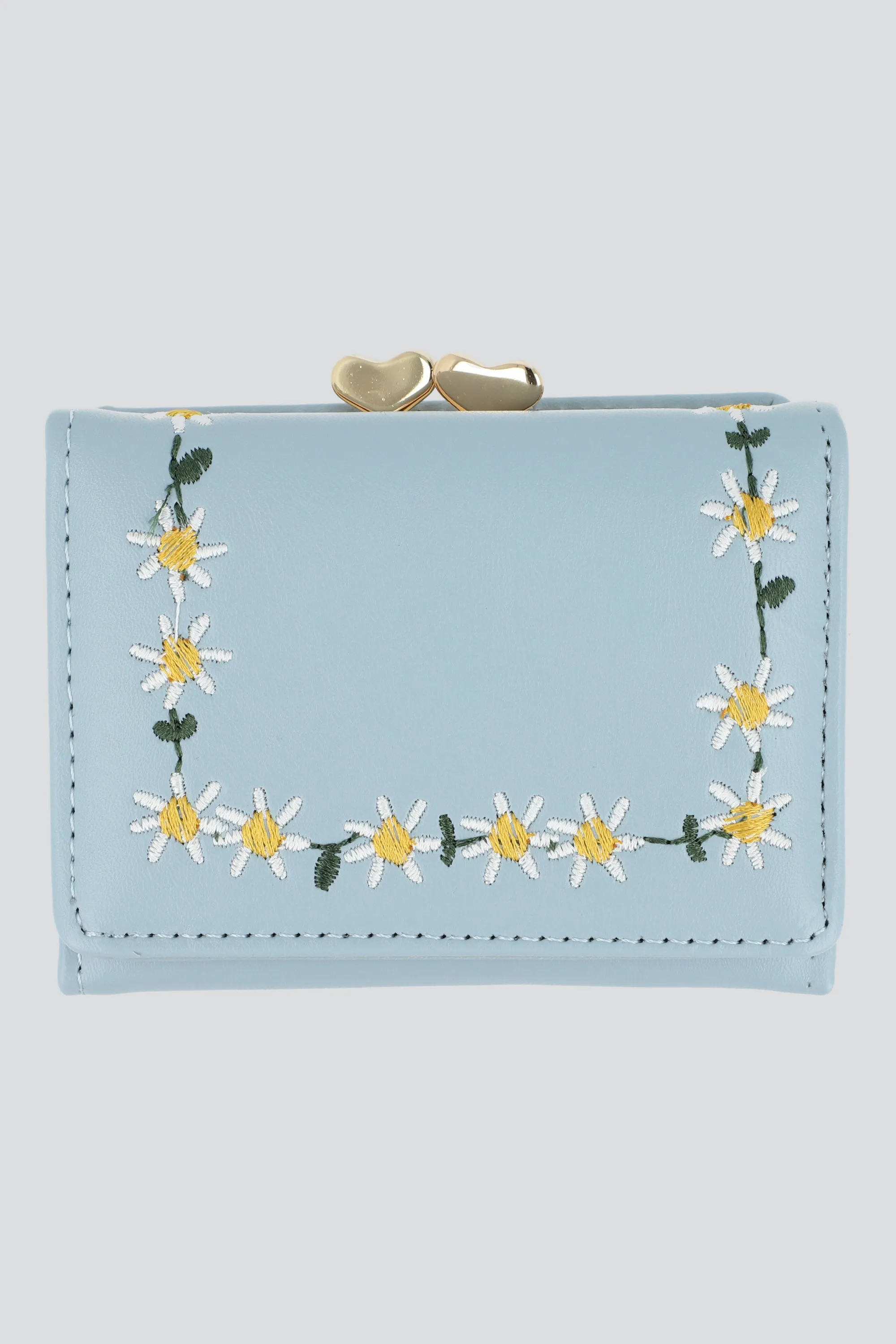 Cartera margaritas bordadas sold by Shasa