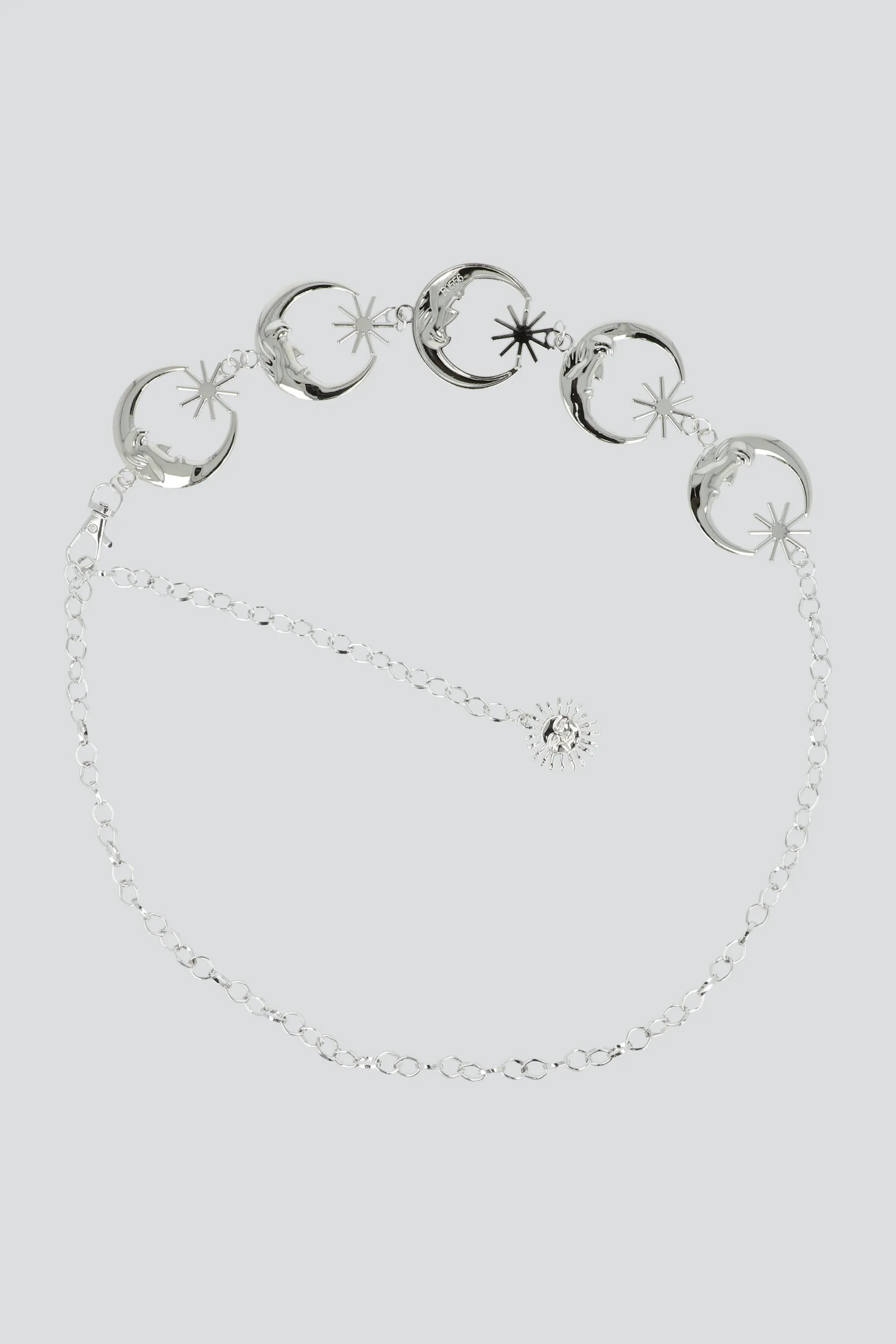 Cinturon cadena lunas sold by Shasa