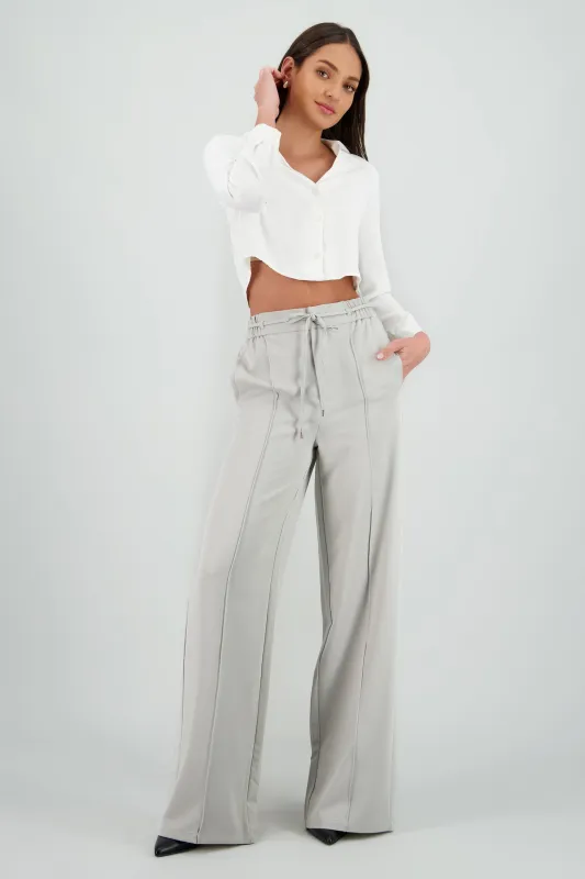 Pantalón ancho pinzas detalle jareta sold by Shasa