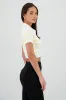 Top tejido cuello polo rayas sold by Shasa