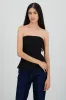 Top strapless con cortes sold by Shasa