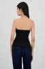 Top strapless con cortes sold by Shasa