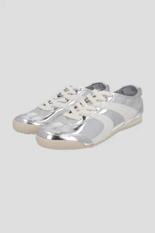 Tenis metálico suela delgada sold by Shasa