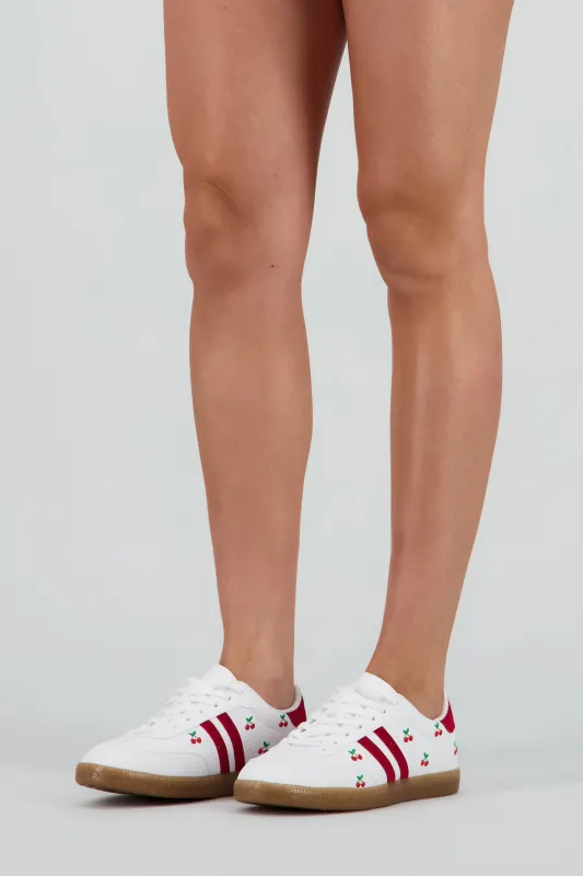 Tenis dos lineas cerezas sold by Shasa