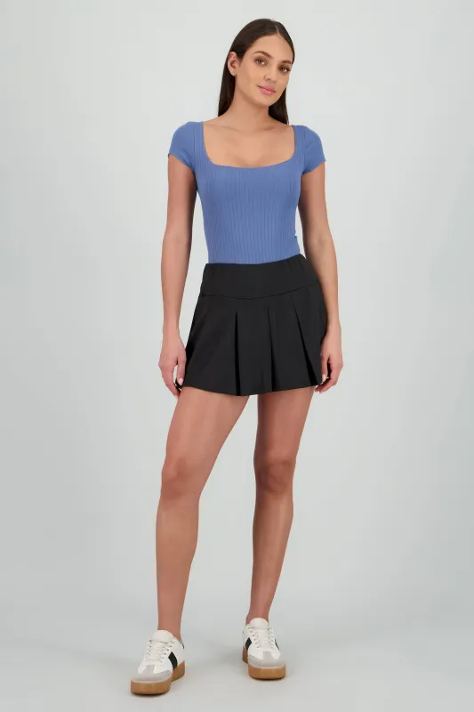 Falda mini tableada con pretina sold by Shasa