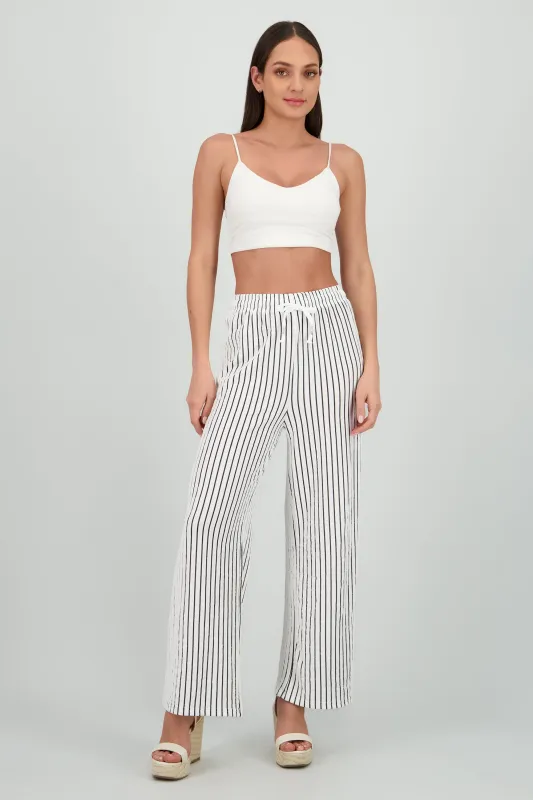 Pantalon rayas fluido sold by Shasa
