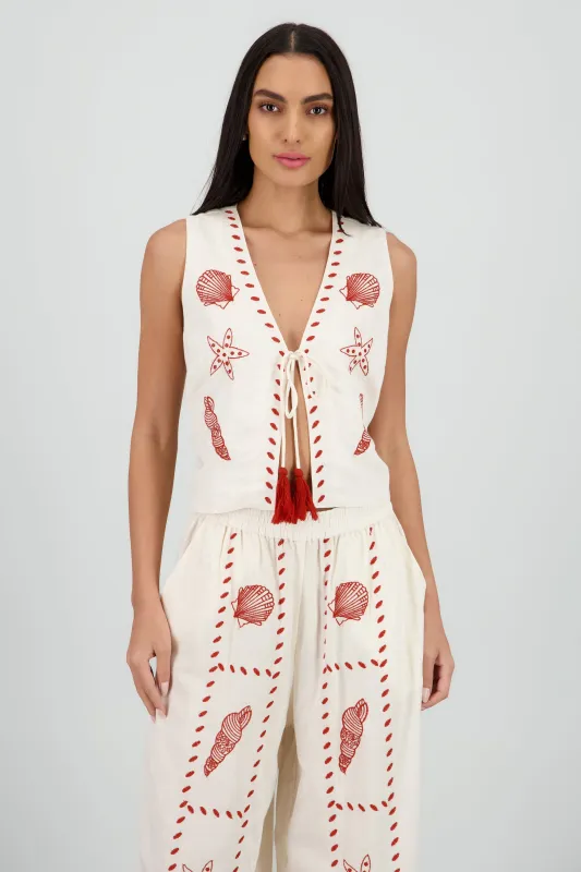 Chaleco amarre borado conchas sold by Shasa