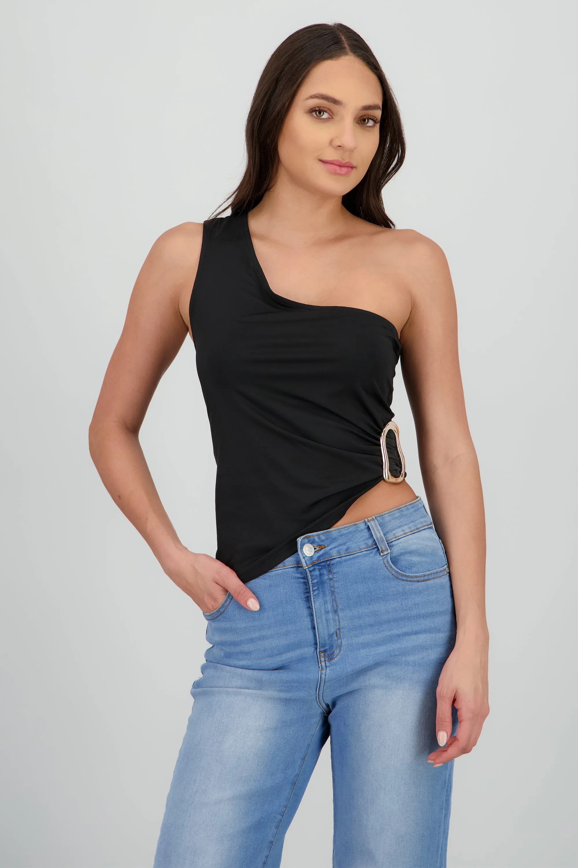 Top asimetrico hebilla sold by Shasa