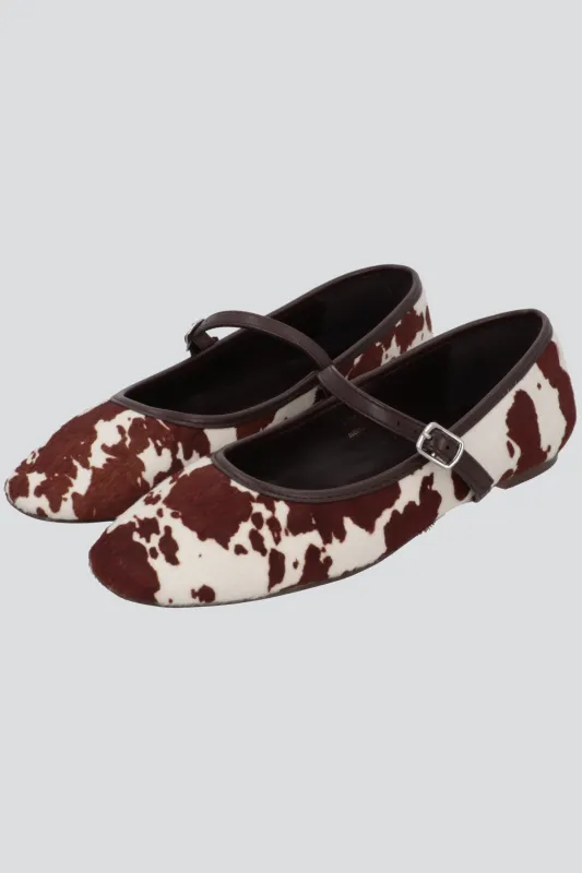 Flat animal print piel sold by Shasa