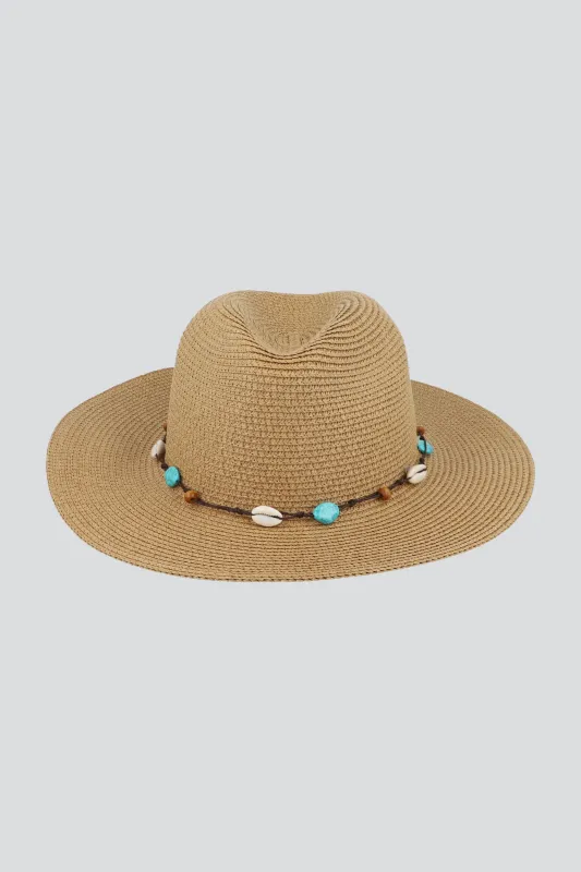 Sombrero de playa conchas sold by Shasa