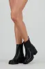 Botin chelsea bajo sold by Shasa