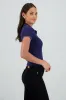 Top cuello polo sold by Shasa